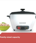 Rice Cooker With 6 Cup Cooked Capacity, No Fuss Steaming Basket And Removable Nonstick Bowl, Auto Keep Warm, shown with rice