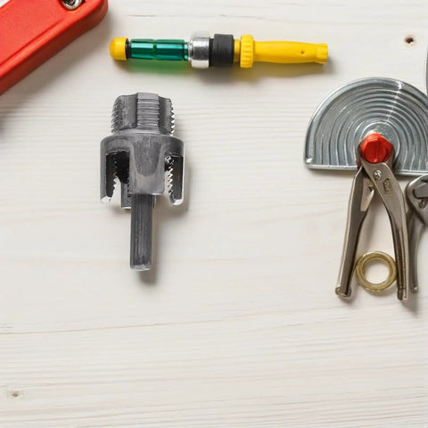 Close-up of an ABOOFAN 3 Pc Pipe Threader Tool Kit part, showcasing heavy-duty steel pipe thread cutter for plumbing work.
