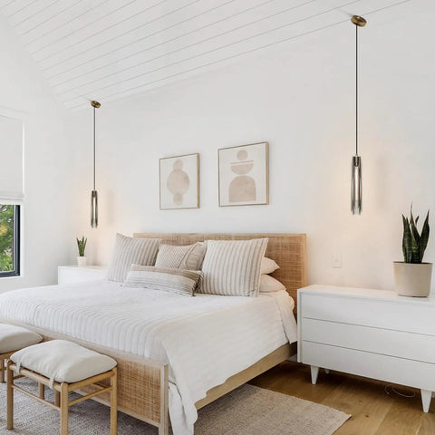 Smokey Crystal Pendant Light In Antique Brass Gold Finish, Long Tube Hanging Fixture above a bed in a modern bedroom