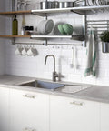 Modern kitchen with white cabinets and stainless steel sink featuring 12 Pack 5 Inch Kitchen Cabinet Handles Brushed Nickel Stainless Steel Cabinet Pulls for Cupboards 3 Inch Center to Center Holes Durable Easy Install Modern Kitchen Drawer and Door Hardware