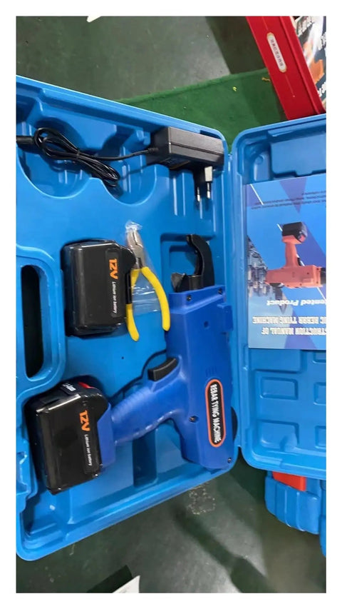 Cordless Lithium Rebar Tying Tool With 12V Battery in blue case with accessories for complex construction sites.