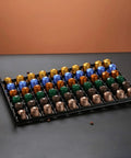 Keep Your Kitchen Game Tight With This Metal Coffee Pod Drawer Holds Sixty Nespresso Capsules Effortless Slide Design Lets You Snag Pods Without Breaking A Sweat, filled with colorful Nespresso pods.