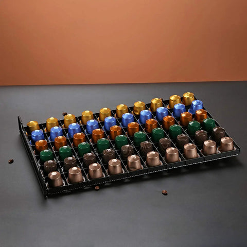 Keep Your Kitchen Game Tight With This Metal Coffee Pod Drawer Holds Sixty Nespresso Capsules Effortless Slide Design Lets You Snag Pods Without Breaking A Sweat, filled with colorful Nespresso pods.