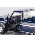 Ford 1979 F150 Pickup Diecast Truck Model In Dark Blue One Twenty Four Scale With Realistic Exterior And Interior Details Old School Vibe And Durable Metal Body Collectible Showpiece For Diecast Fans By Motormax with open driver door showing detailed interior