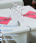 Sturdy Stainless Steel Tablecloth Clips, Rust Proof And Heavy Duty 6 Pack For Indoor Outdoor Use on table with glassware