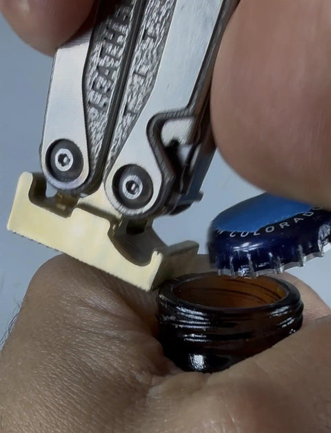 Brass Hammer Head Mod For Multitool With Dual Locking System used to open a bottle cap