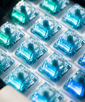 Close-up of V5 Creamy Blue 5 Pin 45gf Pre Lubed Tactile Keyboard Switches For Mechanical Gaming Keyboard in a 45 pack.