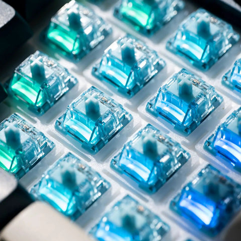 Close-up of V5 Creamy Blue 5 Pin 45gf Pre Lubed Tactile Keyboard Switches For Mechanical Gaming Keyboard in a 45 pack.