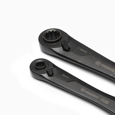 Close-up of Two Piece X6 Four In One Black Oxide Spline Ratcheting Metric Wrench Set, 8mm and 14mm sizes, durable steel construction.