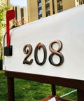 3 Inch House Mailbox Numbers Copper Finish Door Address Sign Stickers For Apartment Office Home Yard Outdoor Or Business Decoration Weatherproof Exterior Numerals Durable Corrosion Resistant Easy To Install displayed on a white mailbox.