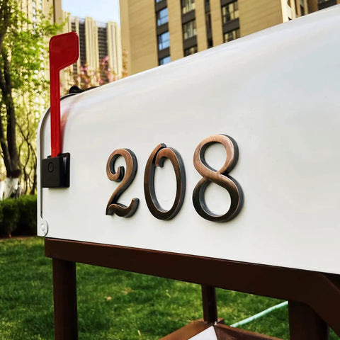 3 Inch House Mailbox Numbers Copper Finish Door Address Sign Stickers For Apartment Office Home Yard Outdoor Or Business Decoration Weatherproof Exterior Numerals Durable Corrosion Resistant Easy To Install displayed on a white mailbox.