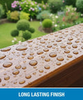 Wood Sealer Spray For Outdoor Wood Protection, 16 Oz Hydrophobic Water Repellent Finish For Decks, Fences, And Floors, No Gloss, Long Lasting, Eco Friendly, Safe For Pets And Plants, Made In USA shown with water beads on wooden deck