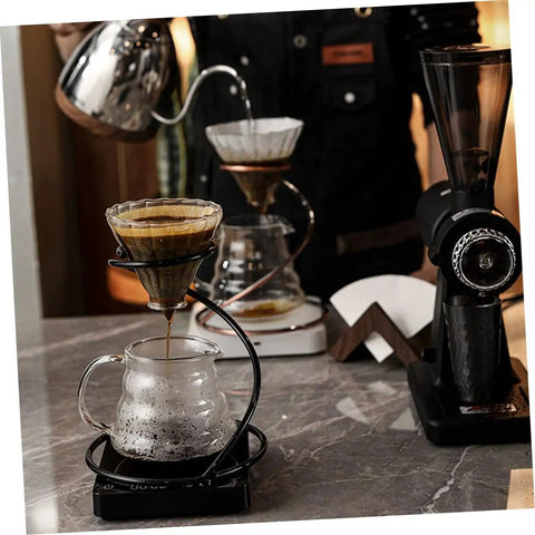 Kick Up Your Morning Brew Game With This Slick Two Piece Coffee Dripper Stand in action with brewing coffee.