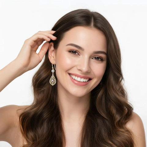 Person showing earrings worn on earlobe.