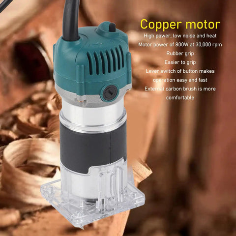 Close-up of Built Tough 800W Electric Palm Router With Clear Base And Soft Touch Rubber Grip Smooth As Butter 30000 Rpm, showing copper motor.