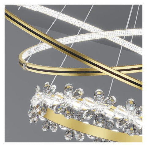 Close-up of Modern Nordic Pendant Light With Dimmable LED Remote And Layered Acrylic Diffuser showcasing gold finish and crystal accents.