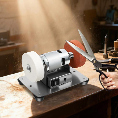 No Nonsense Mini Bench Grinder Rockin A Beefy 96W Copper Motor With Seven Smooth Variable Speeds From 3000 To 6000 Rpm Plus Easy Forward Reverse Controls For Quick Sharpening And Precision Grinding Work on workbench with scissors.