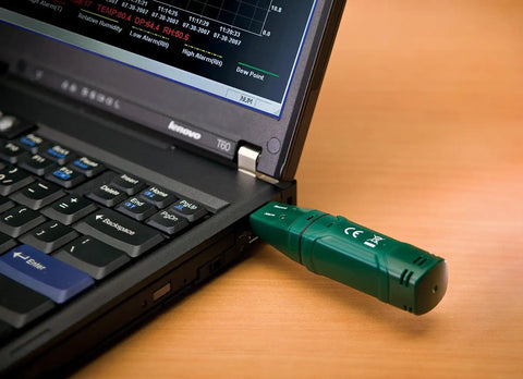 Grab And Go Humidity And Temperature USB Data Logger With 16,000 Readings Memory, connected to laptop showing data graph