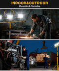 Premium 21000 Lumen Led Work Light With Retractable Tripod Stand And Extended 16 Foot Power Cord illuminating work on machinery in dim light.