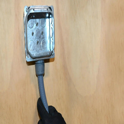 Liquidtite 1 Inch By 100 Foot Ultratite Non Metallic Conduit Gray connected to metal electrical box for flexible wiring