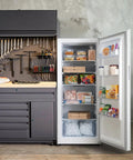 14 Cu Ft Convertible Upright Freezer And Refrigerator In Warm White Panel with ample shelving full of snacks and beverages.