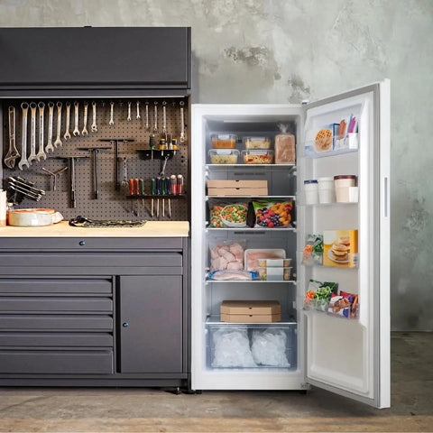 14 Cu Ft Convertible Upright Freezer And Refrigerator In Warm White Panel with ample shelving full of snacks and beverages.