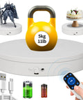 Smooth Spinning 360 Degree Electrical Turntable With Killer Remote Control For Pro Photography And 3D Modeling, Hella Precise Speed And Angle Adjustment, Continuous Step And Swing Modes For Studio Gear Or Retail Display Setup, featuring a 5kg yellow kettlebell.