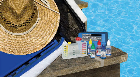 Five Way Pool And Spa Test Kit Featuring Dead On Accuracy For Chlorine Bromine Ph Alkalinity And Acid Demand Inside A Tough Travel Case on stone surface.