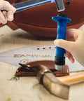 Using 14 Piece Hole Punch Set With Hollow Punch Kit on leather for precise holes, featuring blue punch shaft and tools