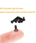 340 Piece M2.5 Black Countersunk Socket Cap Screws And Nylon Lock Nuts And Hex Nuts Kit displayed on fingertip