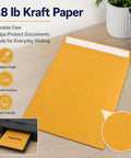 10x13 Inch Kraft Mailing Envelopes With Gummed Seal Closure 28lb Heavyweight Manila Catalog Envelopes for office use on desk