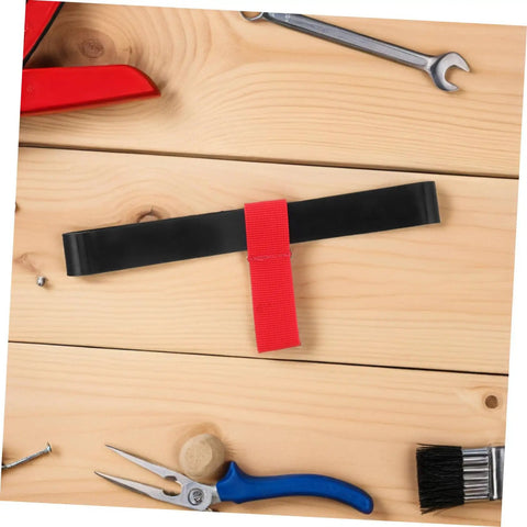 Scuba Tank Strap Holder With Quick Release For Easy Attachment And Transport, red rubber strap on wooden surface