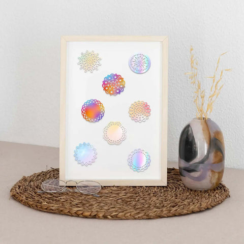 Display of 8 pattern round lace border die set for card making and paper crafting with dope floral motifs in silver finish