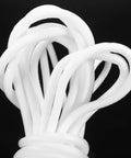 Heavy Duty Foam Caulk Saver Strip for Concrete Gaps and Wall Joints, white foam strips coiled for easy installation.