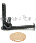 Built Tough Number 10-32 X 1 1/4 Inch Button Head Socket Cap Screws In Heavy Alloy Steel displayed with penny for size reference.