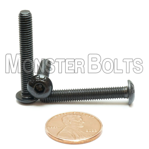 Built Tough Number 10-32 X 1 1/4 Inch Button Head Socket Cap Screws In Heavy Alloy Steel displayed with penny for size reference.