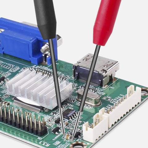 Testing circuit board connections with 4 Pack 2mm Extended Needle Test Probes Pro Grade For Multimeters 600V 10A Non Destructive.