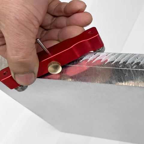 Precision Badass Knife Maker Centerline Scribe Kit Two Pack Adjustable Carbide Tip marking straight lines on metal surface.