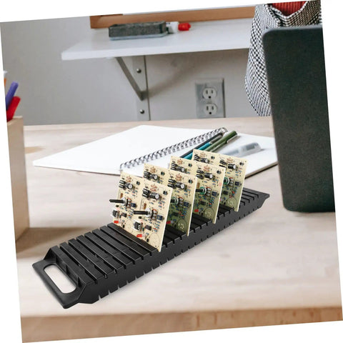 Anti Static Bar Rack With 25 Slot PCB Tray ESD Safe Circulation Shelf on a desk holding circuit boards.
