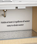 Under Sink Mat For 36 Inch Cabinets Silicone Waterproof Liner Protects Against Leaks Drips And Spills Gray 35 By 22.5 Inch Holds Over 3 Gallons Keeps It Dry Easy Clean Up With Durable Silicone Non Slip Edges For Quick Hassle Free Maintenance shown in cabinet