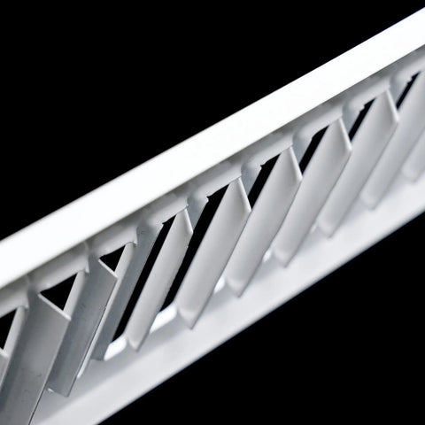 Close-up of Toe Kick Vent Cover For 2x10 Duct Opening No Fuss Fit Cabinet Toe Kick Space Register Grille For HVAC Off White Outer Dimensions 3 3/8 In By 11 3/8 In Easy Install Clean Look Durable Home Upgrade showing louvers at an angle.