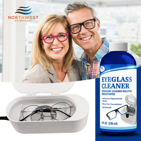 Eyeglass Cleaner ultrasonic solution bottle (blue, 8 oz) beside white eyeglass case with metal-frame glasses; Northwest Enterprises branding.