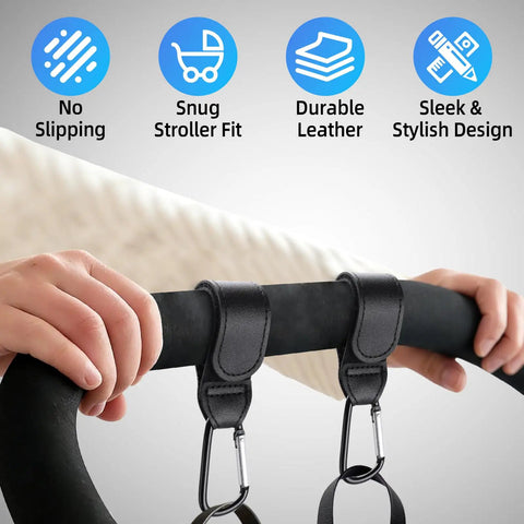 Hands attaching 4 Pack Premium Non Slip Stroller Hooks With Adjustable Carabiner Clips to stroller handle