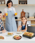 Aigostar 1000w Panini Press Sandwich Maker Non Stick Plates Quick Heat Even Cooking Crispy Grilling Appliance For Home Kitchen Party with a family.