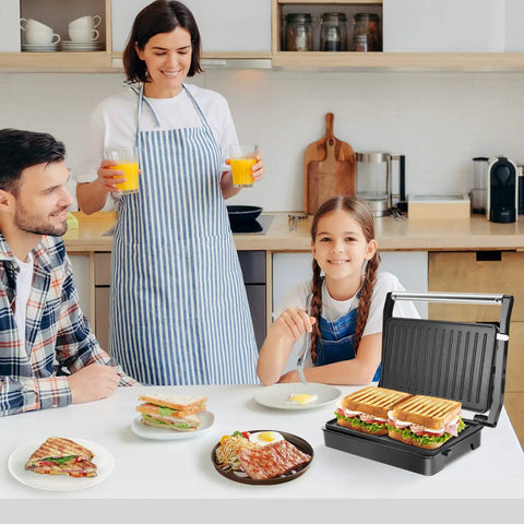 Aigostar 1000w Panini Press Sandwich Maker Non Stick Plates Quick Heat Even Cooking Crispy Grilling Appliance For Home Kitchen Party with a family.