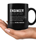 Engineer Definition Ceramic Mug 11 Oz Black Funny Gift For Engineering Students And Pros in hand with white text definition
