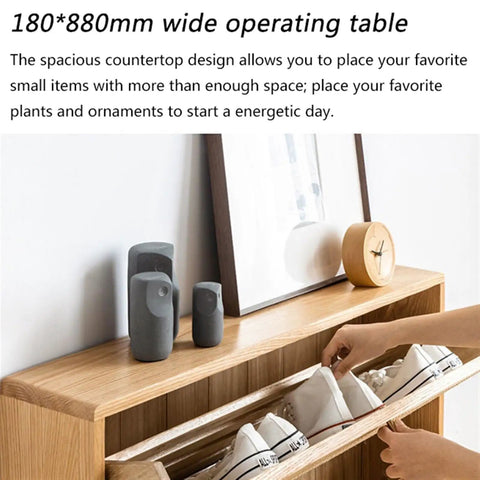 Ultra Slim Wooden Shoe Rack With Swinging Doors And Wide Top Counter Built For Tight Hallways And Mudrooms To Keep Your Kicks Stacked In A Super Slick Walnut Finish with shoes and decor on top.