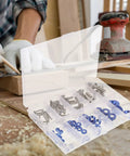 Alloy Countersunk Washer Kit With Handy Storage Box, arranged on a woodworking table with tools in the background.