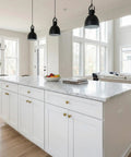 Modern kitchen featuring 40 pack one and one quarter inch mushroom cabinet knobs in champagne bronze zinc alloy on white cabinets