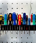Heavy Duty Screwdriver Storage Holder, Space Saving Tool Rack With 2X Capacity holding colorful screwdrivers on wall mount